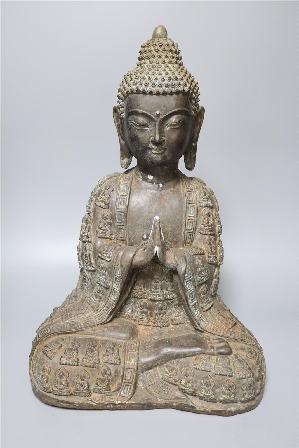 A large bronze Buddha, a Chinese cloisonne enamel figure and a hardstone vase and cover, tallest being 43cm high